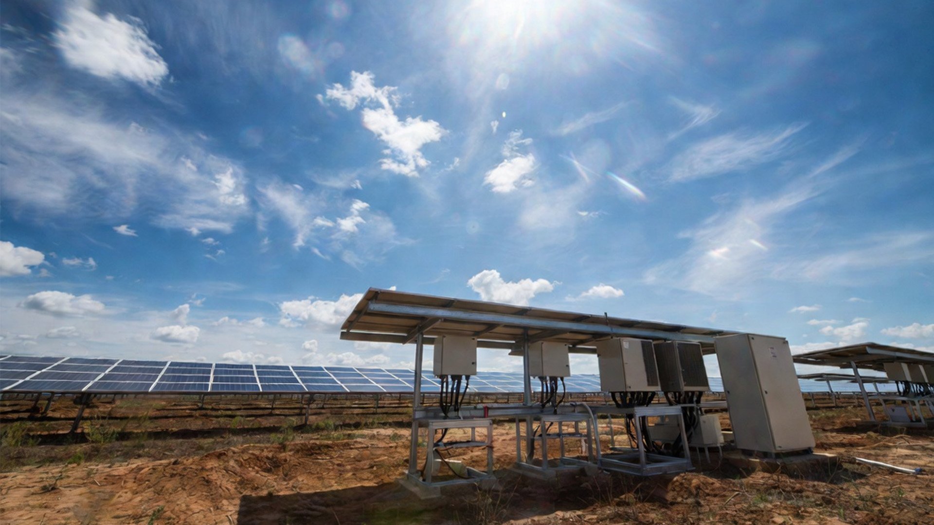 A solar panel installation in a field on a sunny day